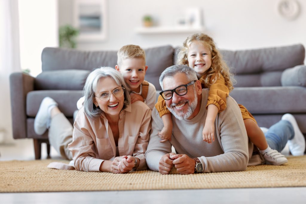 Beautiful Cheerful Family Two Cute Little Kids Hugging With Positive Senior Grandparents On Floor Blood Pressure Guide